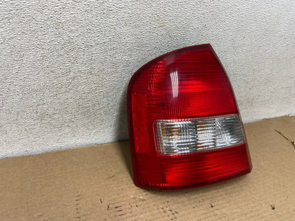 1999 to 2003 Mazda Protege Left Driver LH Side Tail Light AH4080 LK1