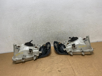 1999-2004 Nissan Pathfinder Left+Right Side Set Halogen Headlights AI7822 DW6