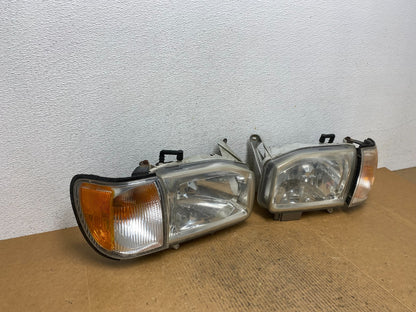 1999-2004 Nissan Pathfinder Left+Right Side Set Halogen Headlights AE1365 DW2
