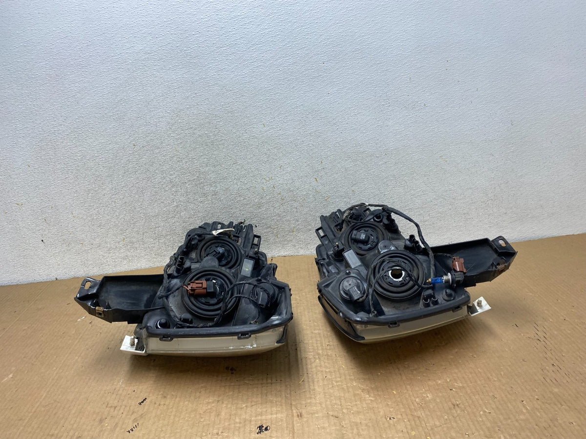 2004 to 2007 Nissan Armada Left+Right Side Set Headlights AI8168 DW11