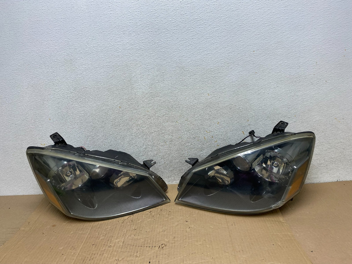 2005 to 2006 Nissan Altima Left+Right Set Halogen Headlights AI1239 DW0