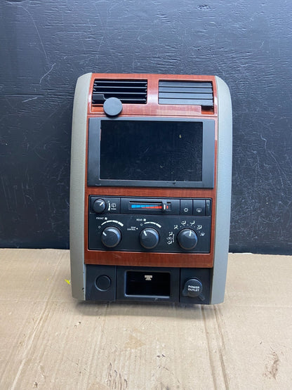 2005-2009 Dodge Durango Heat AC Climate Temp Control Radio Bezel ad7222 DG0