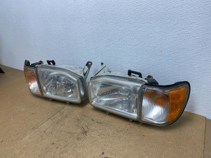 1999-2004 Nissan Pathfinder Left+Right Side Set Halogen Headlights Oem AC3436 DW1