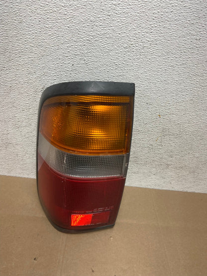 1996 - 1998 Nissan Pathfinder Left Driver LH Side Tail light AE4881 LK0