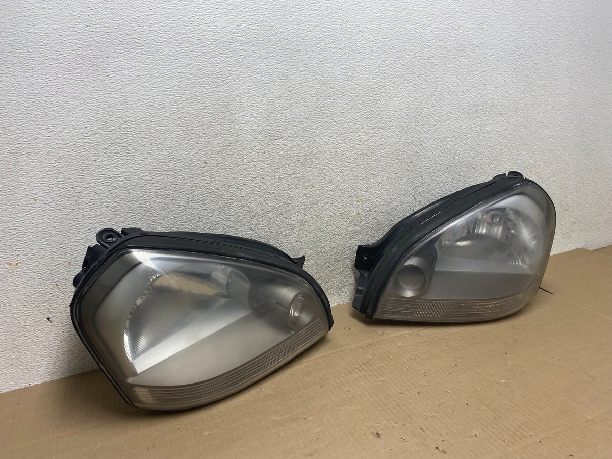 2005 to 2008 Hyundai Tucson Left+Right Side Headlights AI1434 DW2