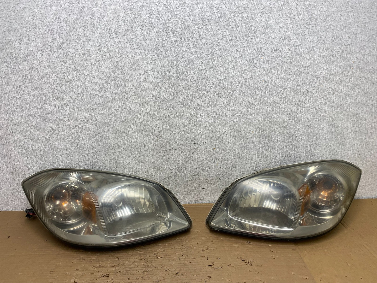 2005 - 2010 Chevrolet Cobalt Sedan Left+Right Headlights AD4374 DW0