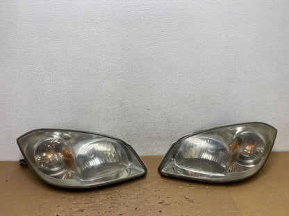 2005 - 2010 Chevrolet Cobalt Sedan Left+Right Headlights AD4374 DW0