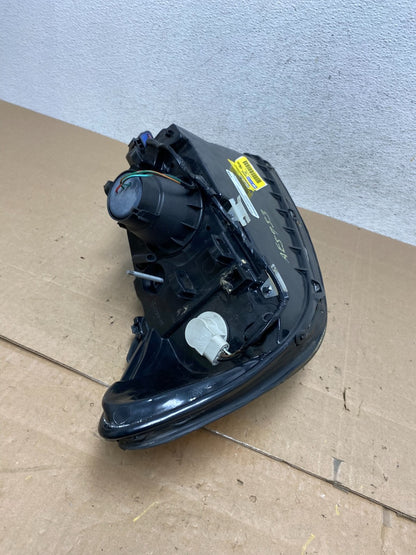 2000 to 2007 Ford Taurus Left Driver LH Side Halogen Headlight TYC AE5953 DW7