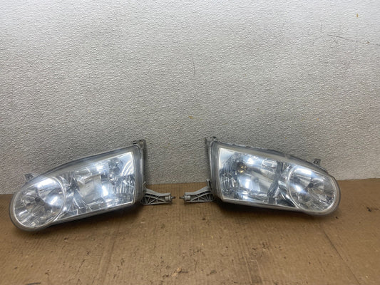 2001-2002 Toyota Corolla Left+Right Side Halogen Headlights OEM AA6835 DW0