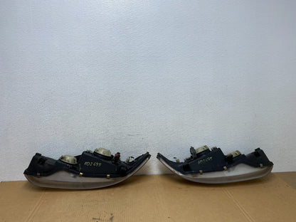 1997 to 1998 Mitsubishi Galant Left+Right Set Headlights Halogen AD2675 DW6