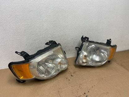 2008 to 2012 Ford Escape Headlights Left+Right Side Set Halogen AF4517 DW2