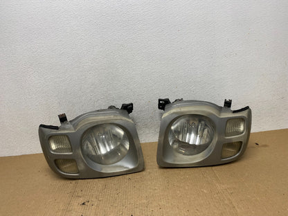 2002 2003 2004 Nissan Xterra Left+Right Side Headlights AF9868 DW0