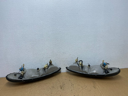 1999 to 2005 Pontiac Grand Am Left+Right Set Headlights AD1184 DG6