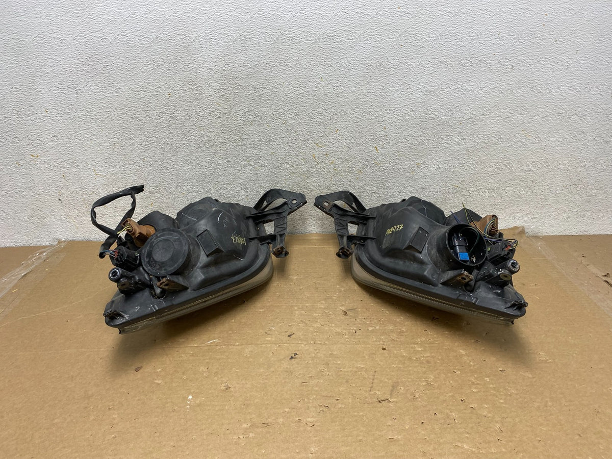 2006 to 2009 Ford Fusion Headlights Left+Right Side AH8427 DW6