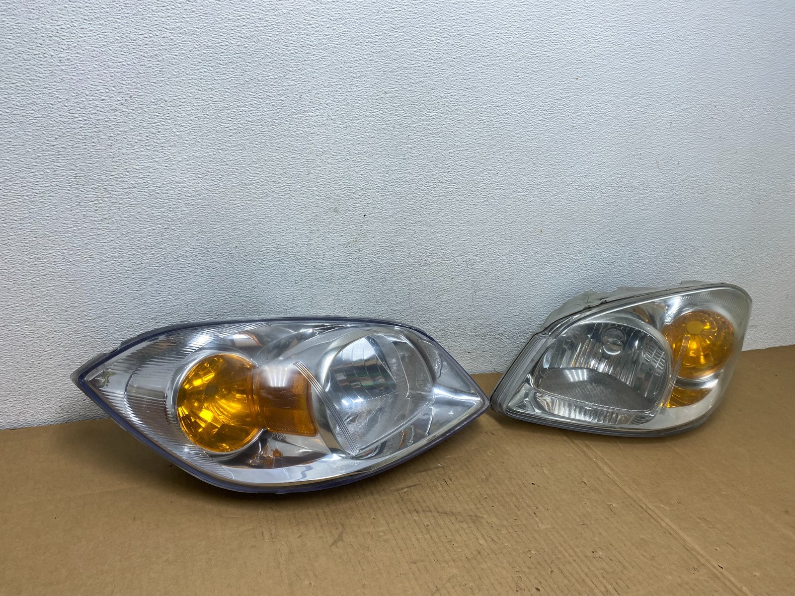 2005 - 2010 Chevrolet Cobalt Sedan Left+Right Set Headlights AC7552 DW2