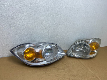2005 - 2010 Chevrolet Cobalt Sedan Left+Right Set Headlights AC7552 DW2