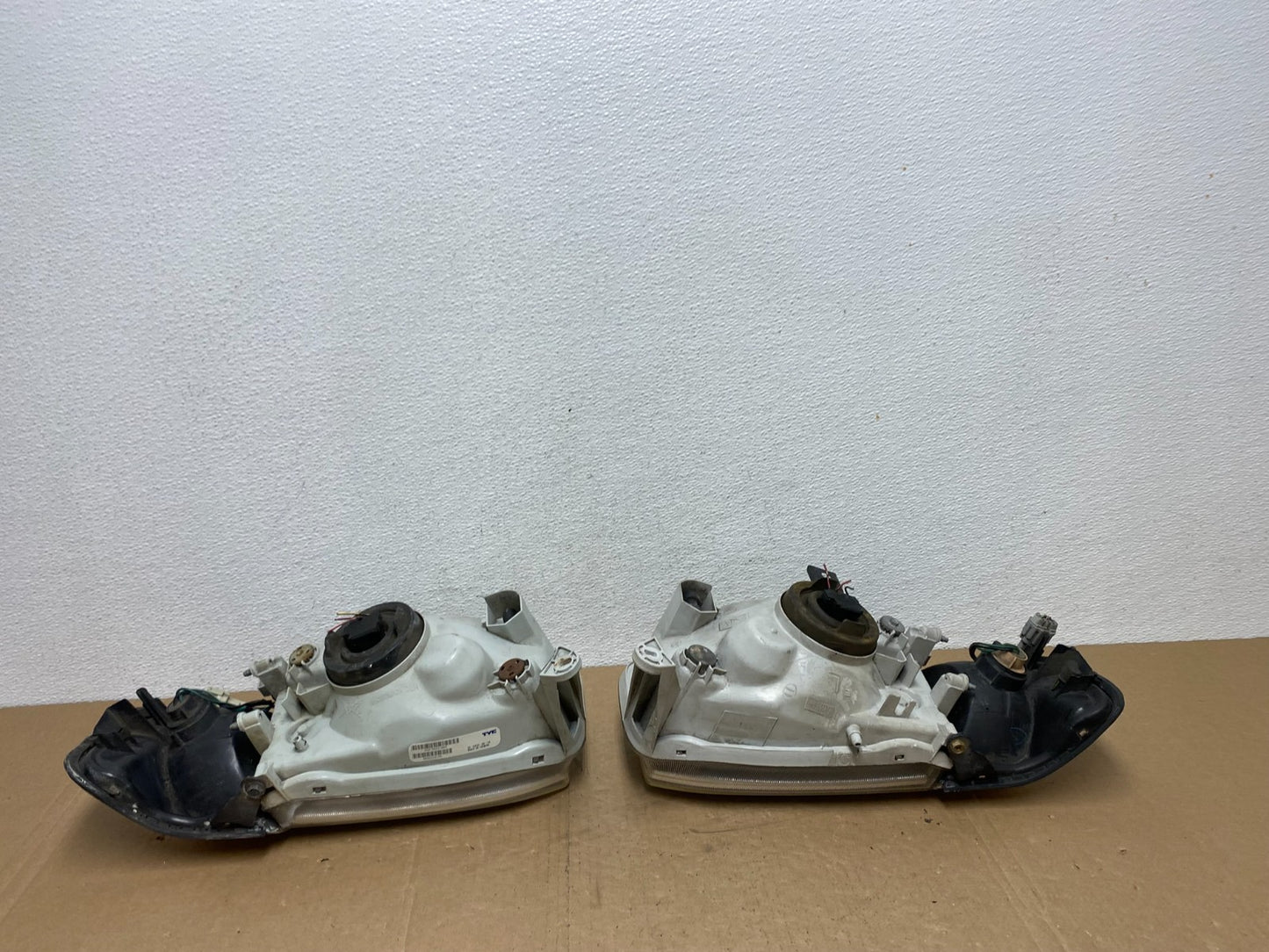 1999-2004 Nissan Pathfinder Left+Right Side Set Halogen Headlights AC5655 DW5