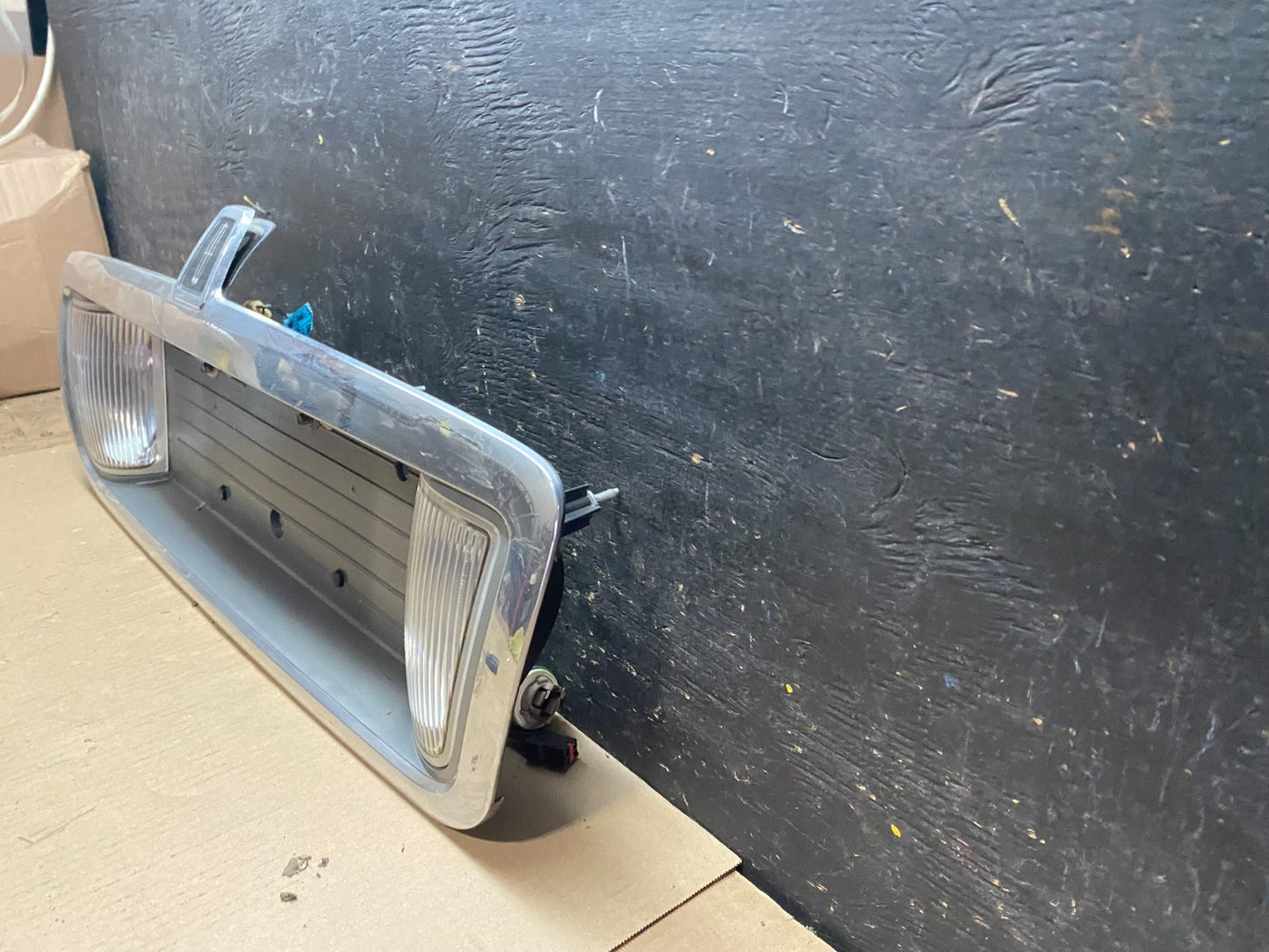 2003 to 2011 Lincoln Town Car Rear License Plate Trim Panel U7464 DG1