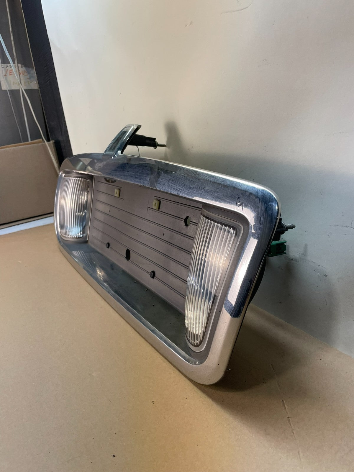 2003 to 2011 Lincoln Town Car Rear License Plate Trim Panel AI3861 DG1