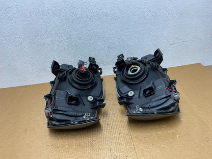 2002 2003 2004 Nissan Xterra Left+Right Side Headlights AE0292 DW8