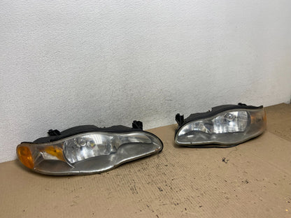 2000 to 2005 Chevrolet Monte Carlo Left+Right Side Set Headlights AF6018 DG2