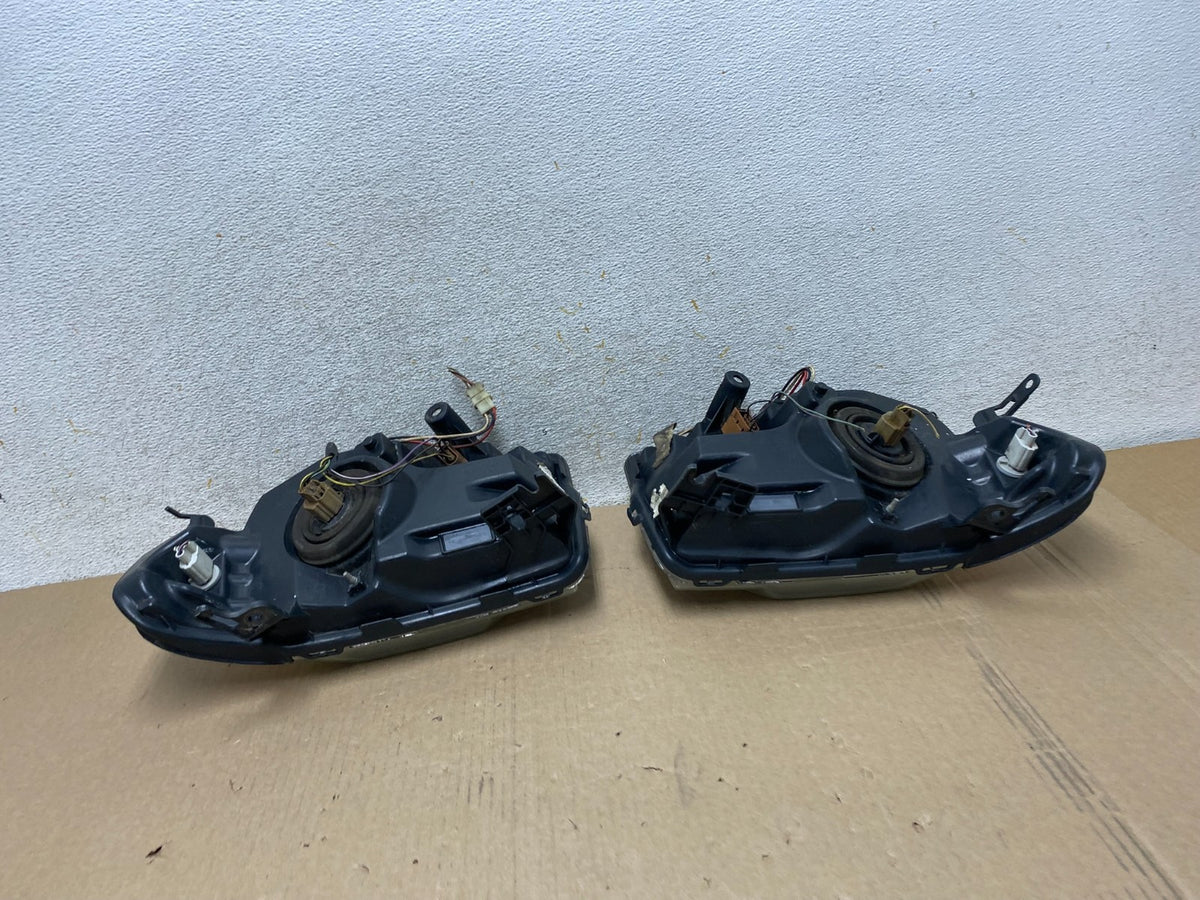 2008 to 2012 Ford Escape Headlights Left+Right Side Set Halogen AJ1965 DW10