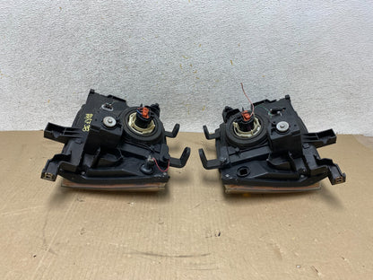 2005-2015 Nissan Xterra Driver Left+Right Side Set Headlights AH6738 DW9