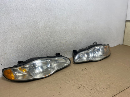 2000 to 2005 Chevrolet Monte Carlo Left+Right Side Set Headlights AI2324 DW2