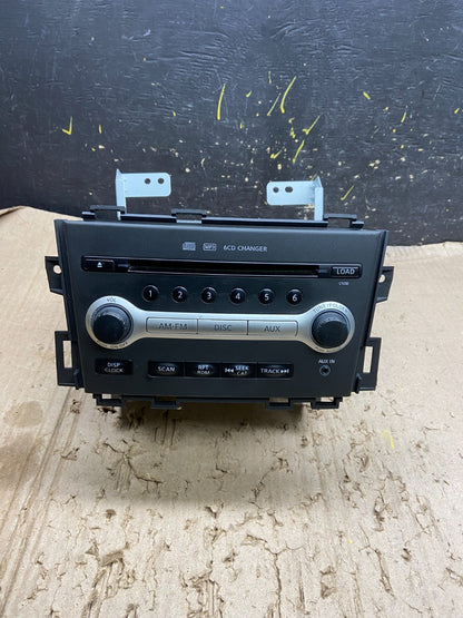 2009-2010 Nissan Murano AM FM Radio 6 CD Control Panel X6435 DG0