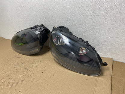 2005 to 2010 Volkswagen Jetta Left+Right Side Headlights Halogen AE7135 DW1