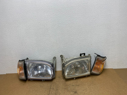 1999-2004 Nissan Pathfinder Left+Right Side Set Halogen Headlights AC3441 DW0