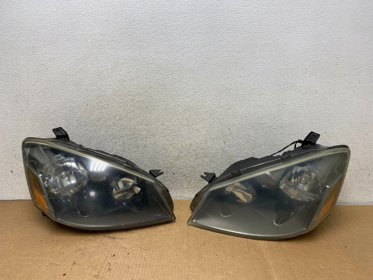 2005 to 2006 Nissan Altima Left+Right Side Set Halogen Headlights AI8813 DW0