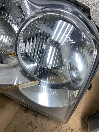 2005-2007 Jeep Grand Cherokee Left+Right Halogen Headlights W0867 DW7