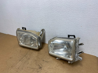 1999-2004 Nissan Pathfinder Left+Right Side Set Halogen Headlights Oem AC3402 DW1