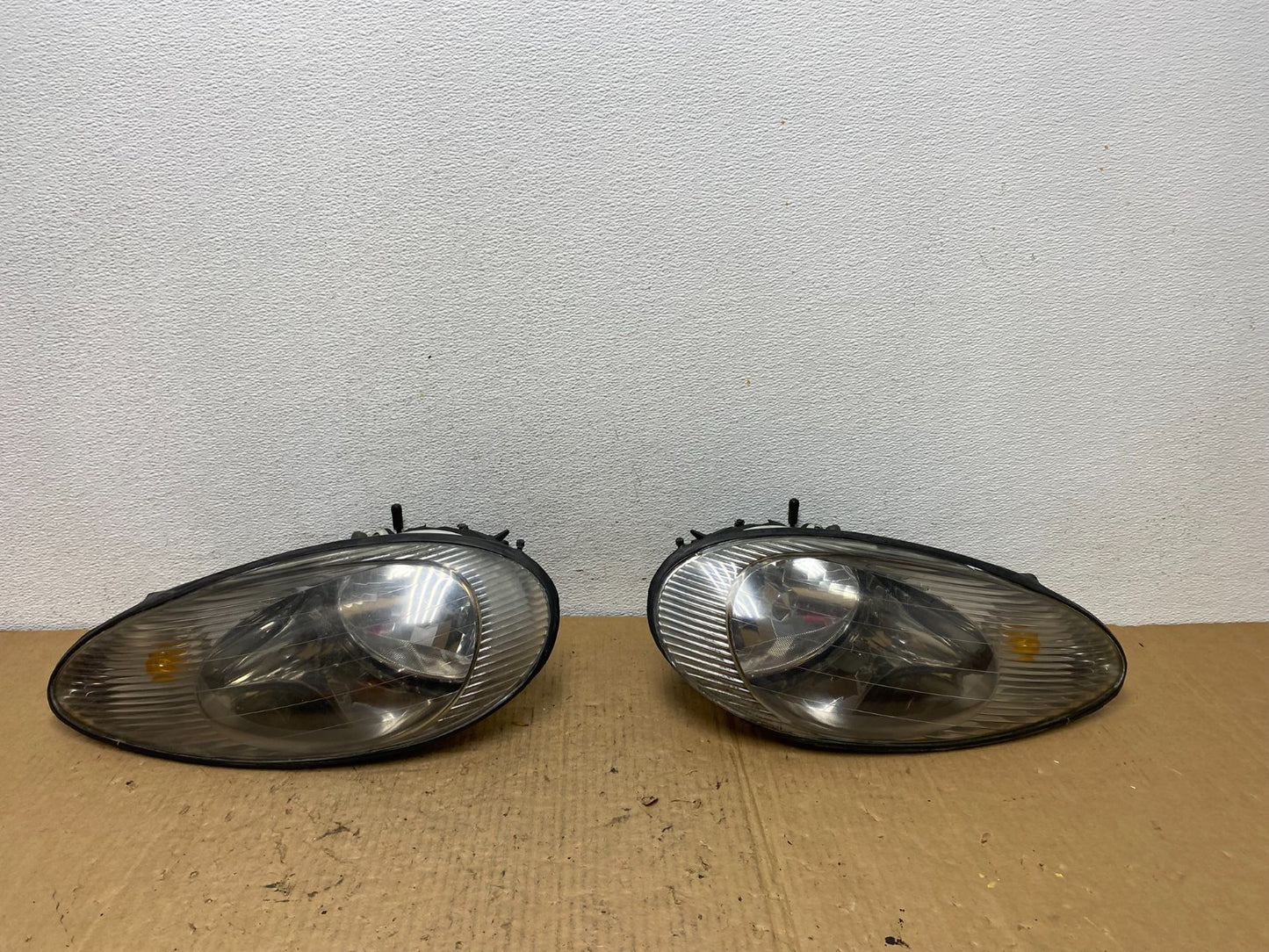 1996 to 1999 Mercury Sable Left+Right Side Set Halogen Headlights AC8121 DG0