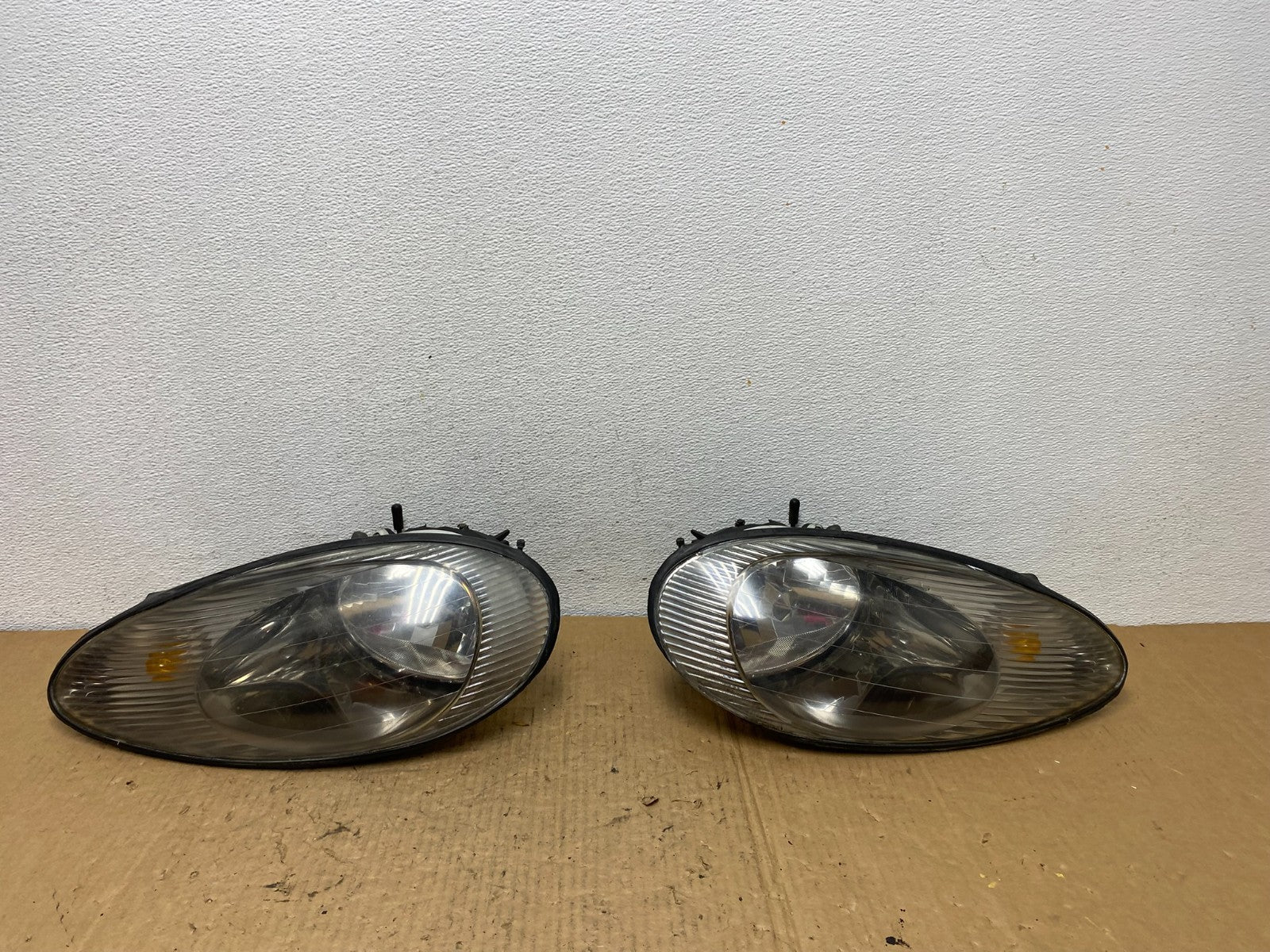 1996 to 1999 Mercury Sable Left+Right Side Set Halogen Headlights AC8121 DG0