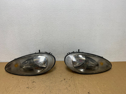 1996 to 1999 Mercury Sable Left+Right Side Set Halogen Headlights AC8121 DG0