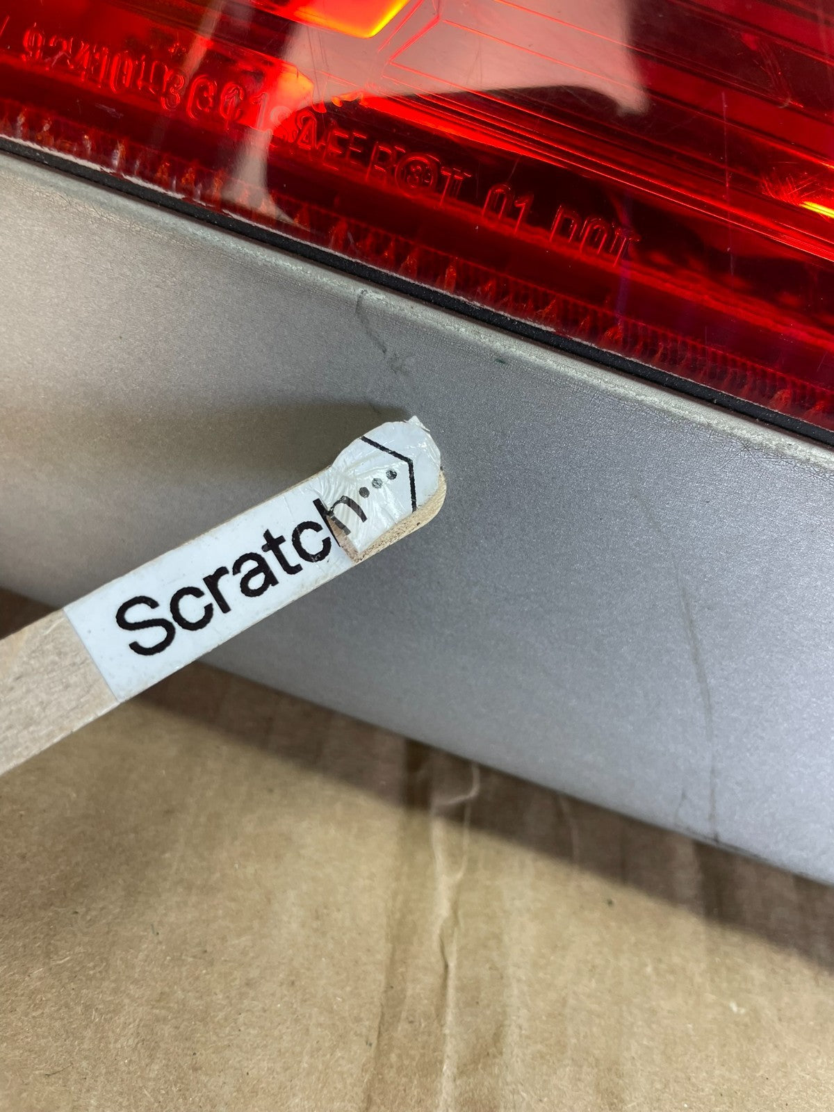 2003 to 2006 Kia Optima Rear License Plate Center Tail Light Panel AG3120 DG3