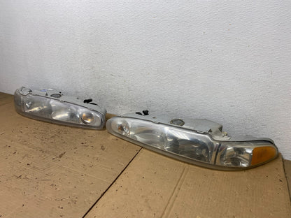 1998 to 2002 Oldsmobile Intrigue Left+Right Side Halogen Headlights AD4373 DG1