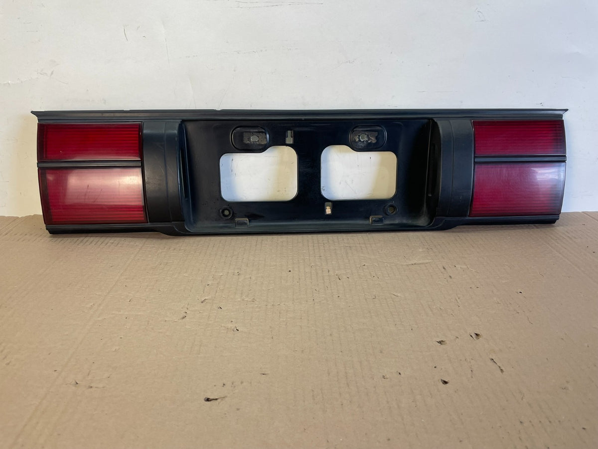 88 - 92 Toyota Corolla AE90 AE91 AE92 Rear Tail Lights License Garnish AH6542 PS0