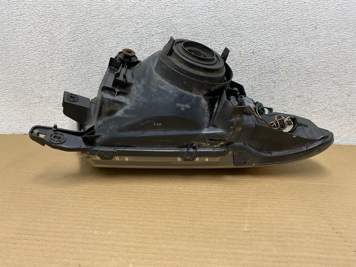 2000 to 2004 Mitsubishi Montero Pajero Left Driver LH Headlight AG9311 DW8