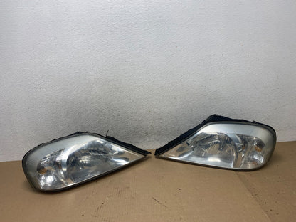 2000 to 2005 Mercury Sable Left+Right Side Halogen Headlights AG5739 DW0