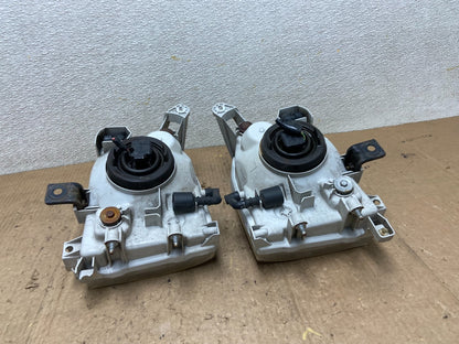 1999-2004 Nissan Pathfinder Left+Right Side Set Halogen Headlights Oem AA7153 DW9