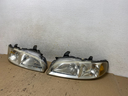 2000 to 2003 Nissan Sentra Front Left+Right Side Headlights AH6613 DW2