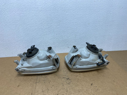 1999-2004 Nissan Pathfinder Left+Right Side Set Halogen Headlights AC3323 DW6