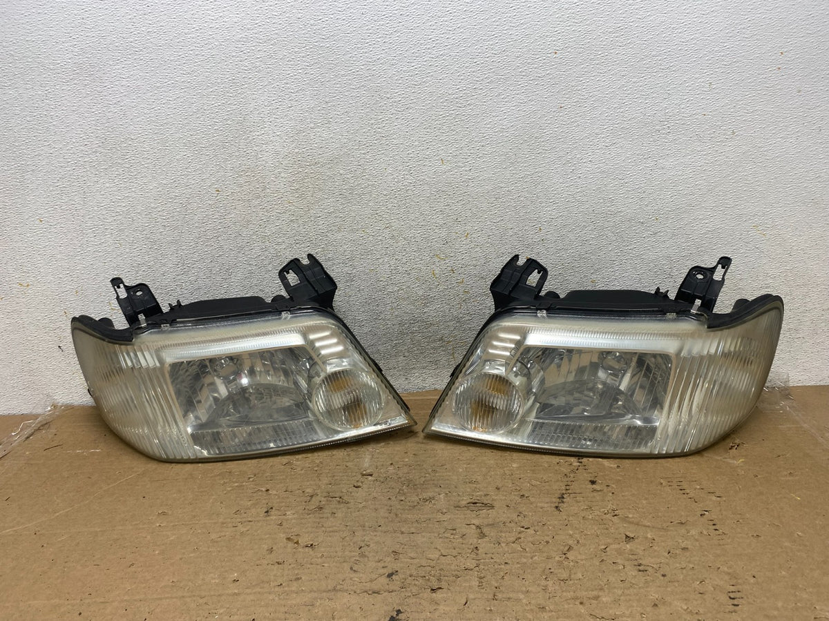 2005 to 2007 Mercury Mariner Left+Right Side Halogen Headlights AH9268 DW0