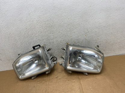 1999-2004 Nissan Pathfinder Left+Right Side Set Halogen Headlights AI6516 DW0