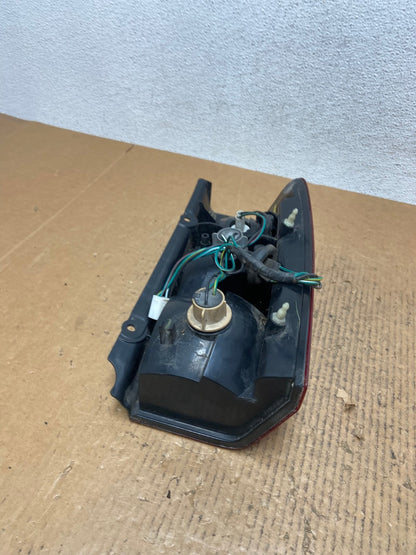 2002 2003 2004 Nissan Xterra Left Driver Side Tail Light AE1400 LK7