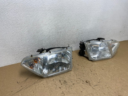 2001 to 2002 Nissan Quest Left+Right Side Halogen Headlights AG1370 DW2