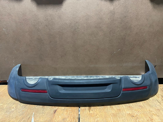2011 to 2015 Ford Explorer Rear Bumper Cover T1336 PS0